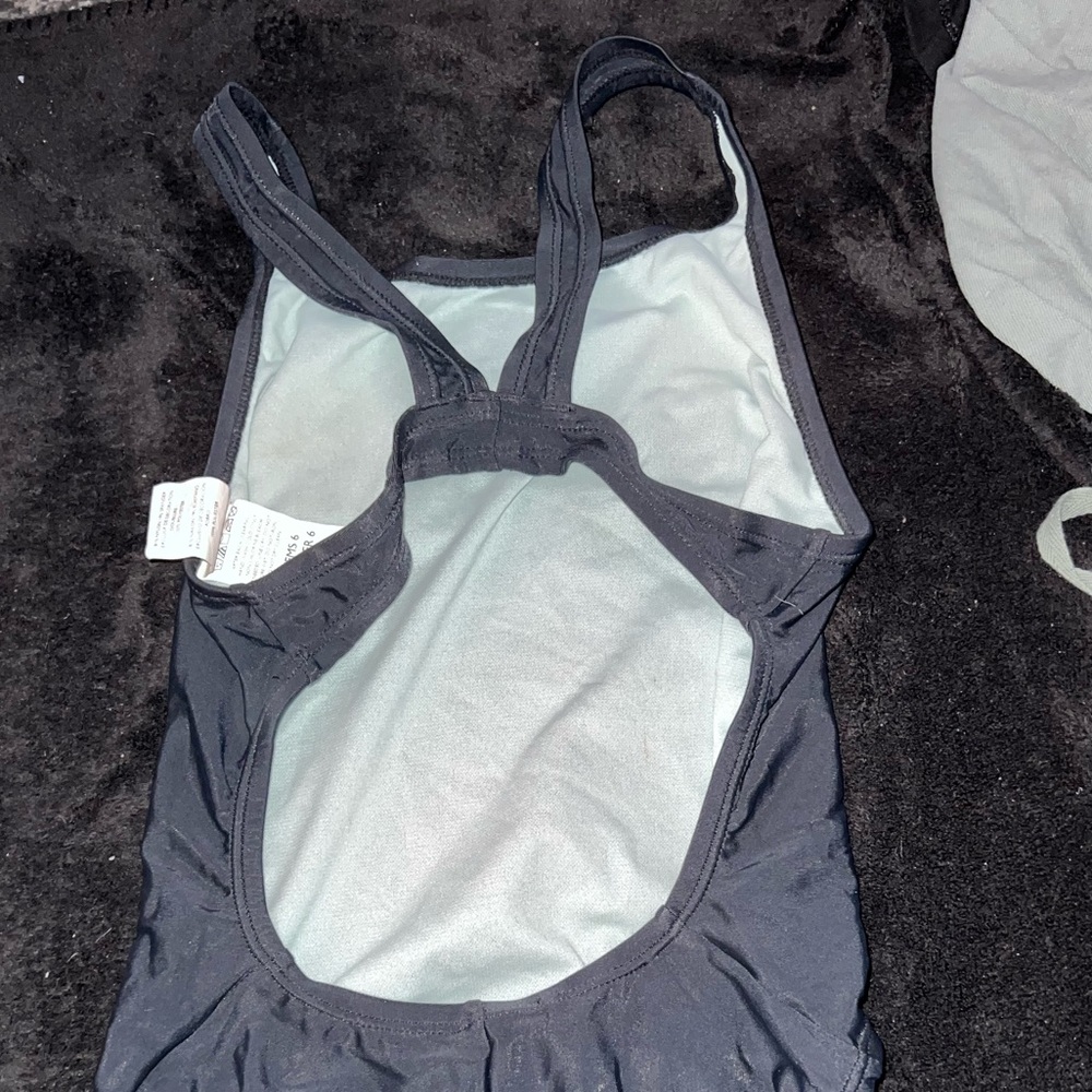 Nike swim suit. Size 6 and black